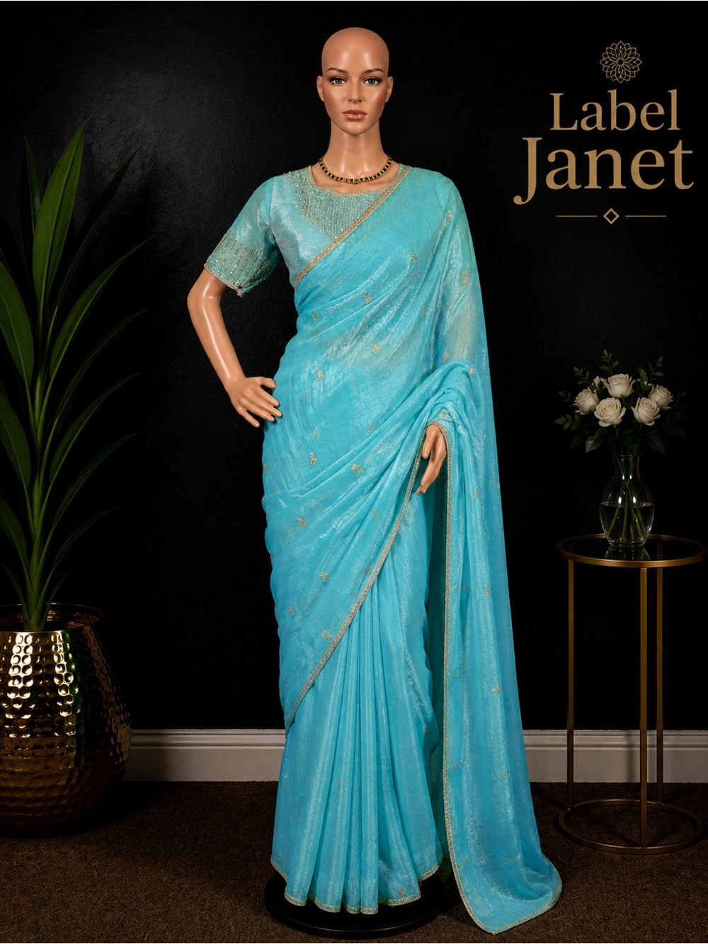 Brand new blue tissue silk saree with stitched blouse (34” - 42”)